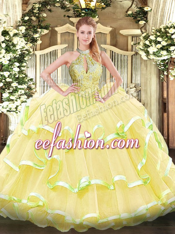 Charming Yellow Ball Gowns Organza Halter Top Sleeveless Beading and Ruffled Layers Floor Length Lace Up Quinceanera Dresses