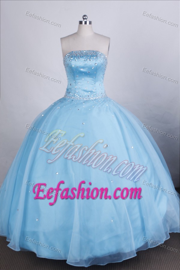 Sophisticated Strapless Dresses for a Quince with Beading in Light Blue in Organza