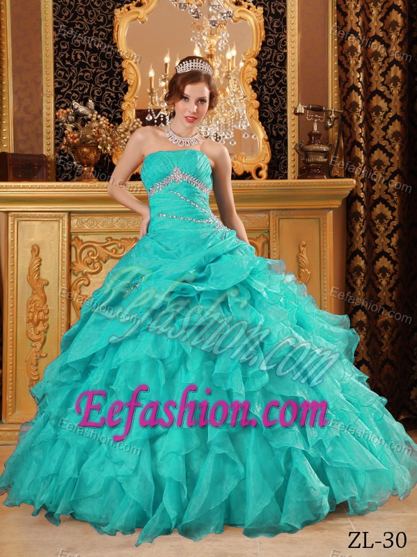 Latest Turquoise Strapless Ruched Quinceanera Dress with Ruffles and Beading