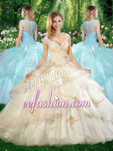 Fashionable Straps Champagne Quinceanera Dresses with Beading and Appliques