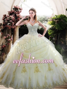 Exquisite Custom Designed White Quinceanera Gown with Appliques and Beading