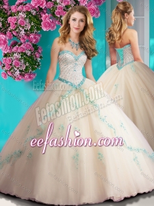 Elegant Beaded and Applique Tulle Fashionable Quinceanera Dresses in Champagne