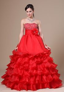 Beaded Strapless Red Carpet Dress with Flower and Ruffled Layers in Red
