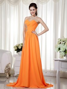 Nice Orange Sweetheart Celebrity Dress for Prom with Beading and Ruche