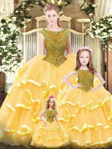 Gold Ball Gowns Beading and Ruffled Layers 15th Birthday Dress Lace Up Organza Sleeveless Floor Length