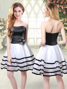 Glorious Sleeveless Organza Mini Length Zipper in White And Black with Ruffled Layers and Hand Made Flower