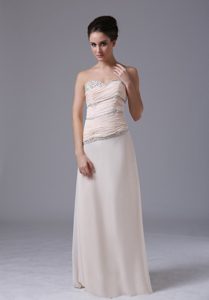 Champagne Strapless Long Celebrity Dresses with Ruching and Beading