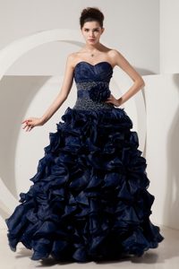 Sweetheart Princess Navy Blue Beaded Celebrity Dress with Ruffles and Flower