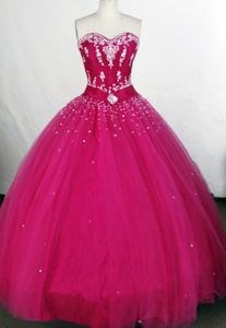 Attractive Quinces Gowns in Fuchsia with Embroidery and Beading Made