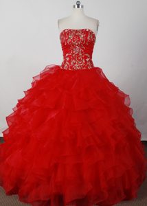 Extravagant Red Quinceanera Dress with Embroidery and Ruffled Layers in Organza