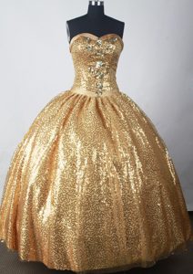 Dramatic Ball Gown Strapless Dresses for Quinces in Gold with Beads and Sequins