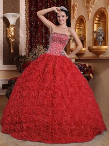 Red Strapless Fabric with Rolling Flowers Beading Quince Gown Dresses