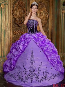 Purple Ball Gown Strapless Quinceanera Dresses with Embroidery in