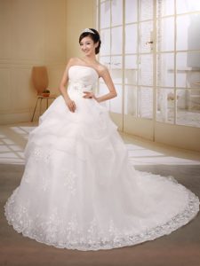 Luxurious Plus Size Princess Lace-up Court Train Wedding Dress with Beading