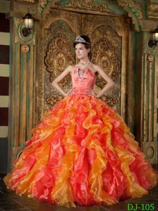 Luxurious Orange Red Long Organza Spring Quinceanera Gowns with Ruffles