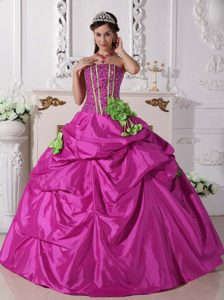 Fuchsia Strapless Beaded Quinceanera Dress with Pick-ups and Flowers