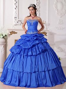 Blue Strapless Layered Quinceanera Dress with Pick-ups and Appliques