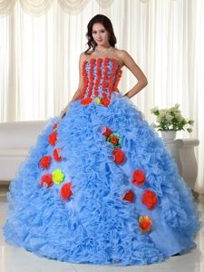 Strapless Long Blue Quinceanera Dress with Ruffles and Colorful Flowers