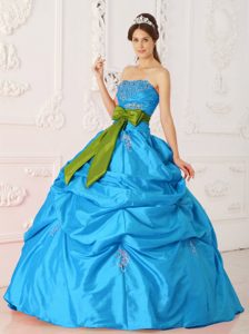 Aqua Blue Beaded Sweet 15 Dress with Green Bowknot and Pick-ups