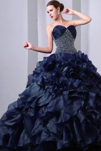 Navy Blue Beaded and Ruffled Quinces Dresses with Heart Sharped Neckline