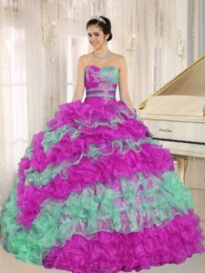 Multi-colored Sweetheart Ruched Quinceanera Dress with Ruffles and Appliques