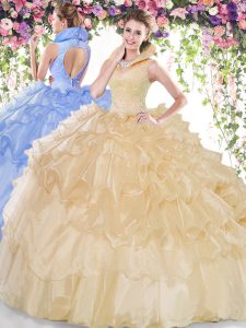 Sleeveless Organza Floor Length Backless Quinceanera Gown in Champagne with Beading and Ruffled Layers