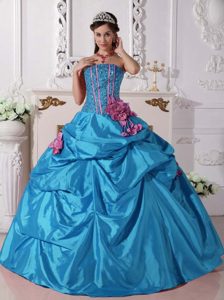 Teal Ball Gown Strapless Dress for Quince in with Hand Flowers