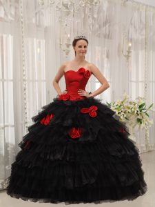 Beautiful Red and Black Strapless Quinceanera Dress with Ruffles and Flowers