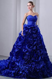 Royal Blue Princess Dress for Quince with Rolling Flowers and Ruching