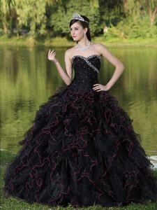 Beaded Sweetheart Black Quinceanera Dress in Organza with Ruffled Layers