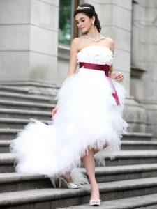 Flare White Sleeveless Ruffles and Belt and Hand Made Flower High Low Wedding Gown